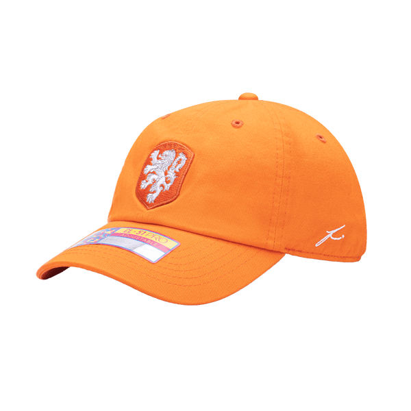 Side view of the Netherlands Bambo Classic hat with low unstructured crown, curved peak brim, and buckle closure, in orange.